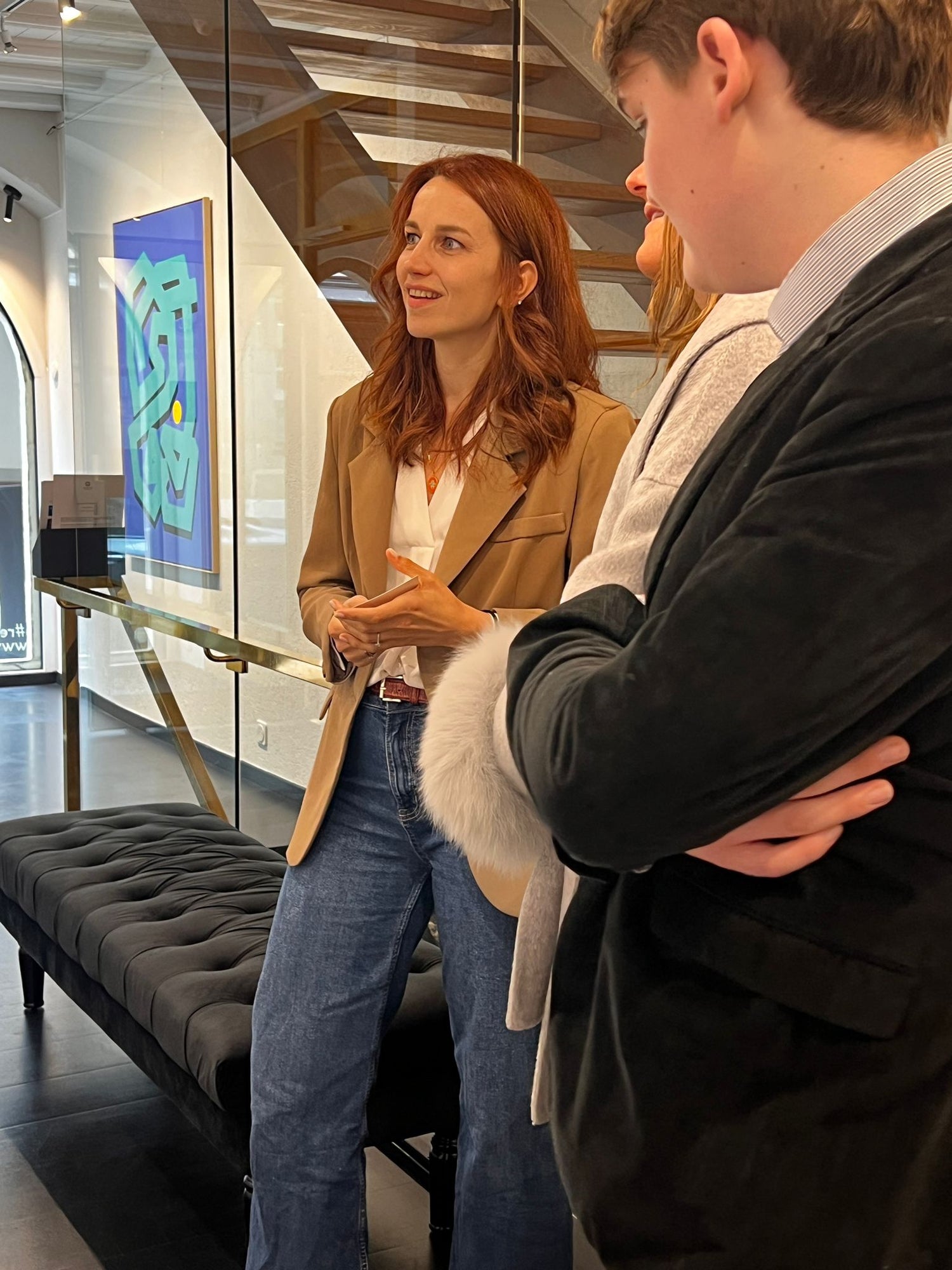 Eilena Braye during her 2025 solo show at Galerie Renaissance, Geneva — contemporary abstract screen prints and paintings on display in a bright, modern exhibition space