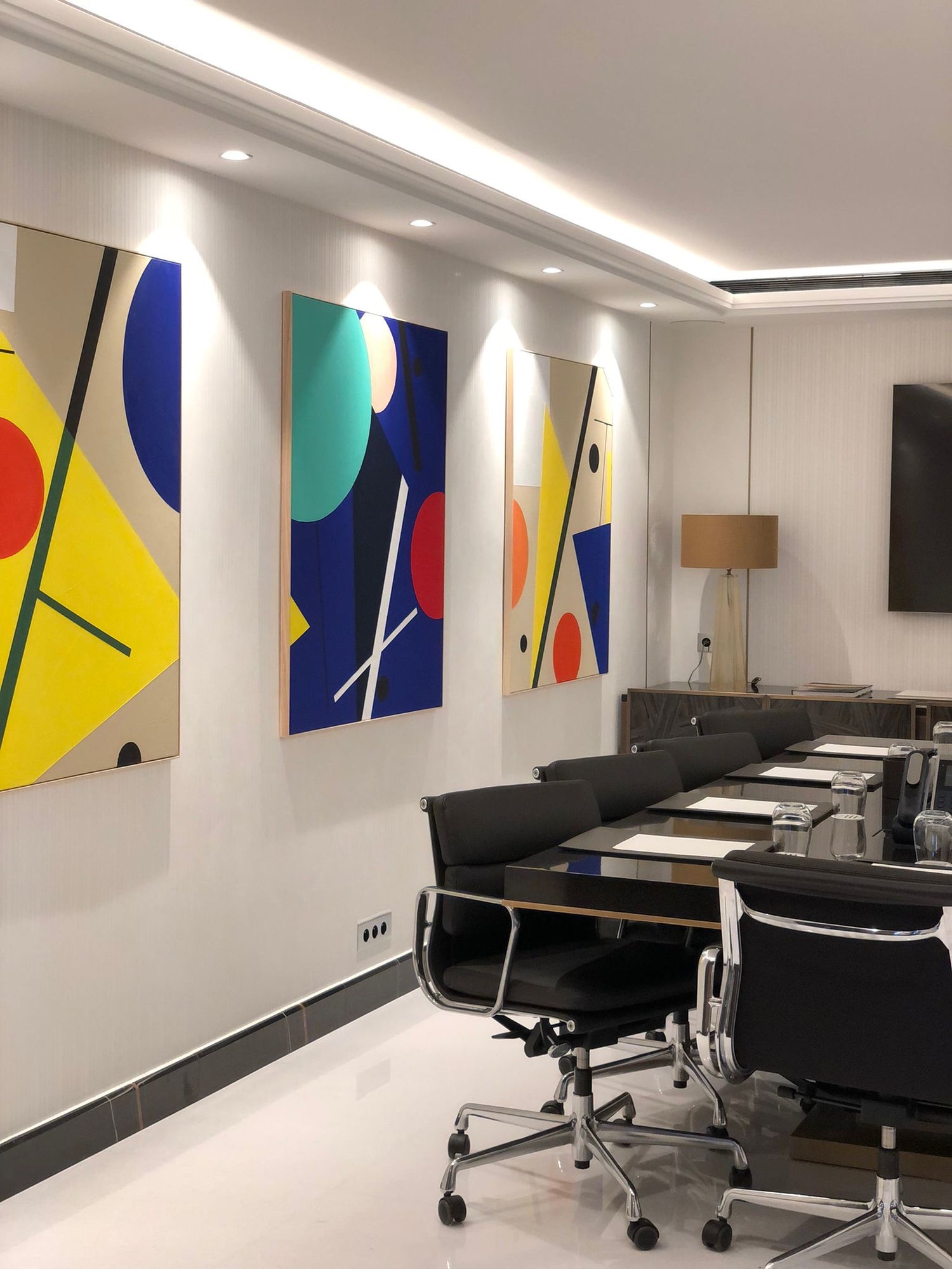 Eilena Braye triptych installed at Bay House Monaco — contemporary abstract geometry in a luxury interior